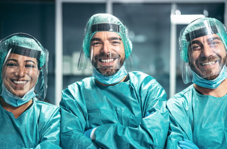 Smiling medical team in scrubs